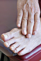 Foot with hand treatment